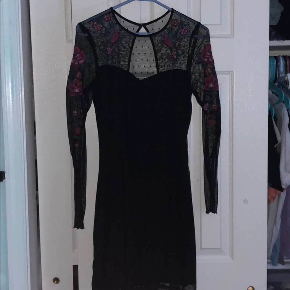 adorable black dress with floral stitching